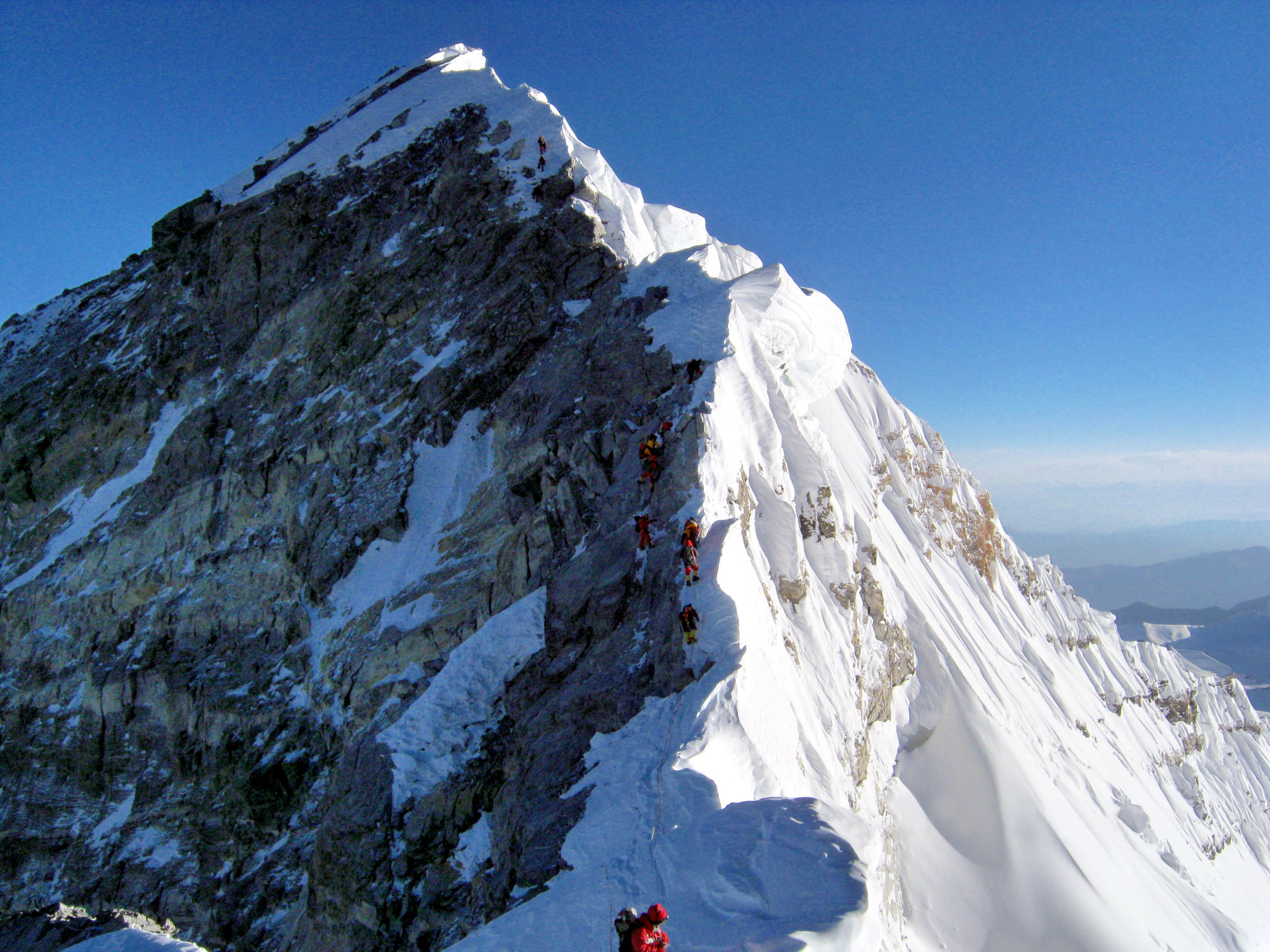 People scaling Hillary Step, near the top of Mt. Everest.
